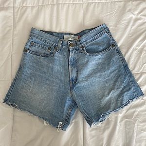 Levi’s 569 light wash cut off shorts.